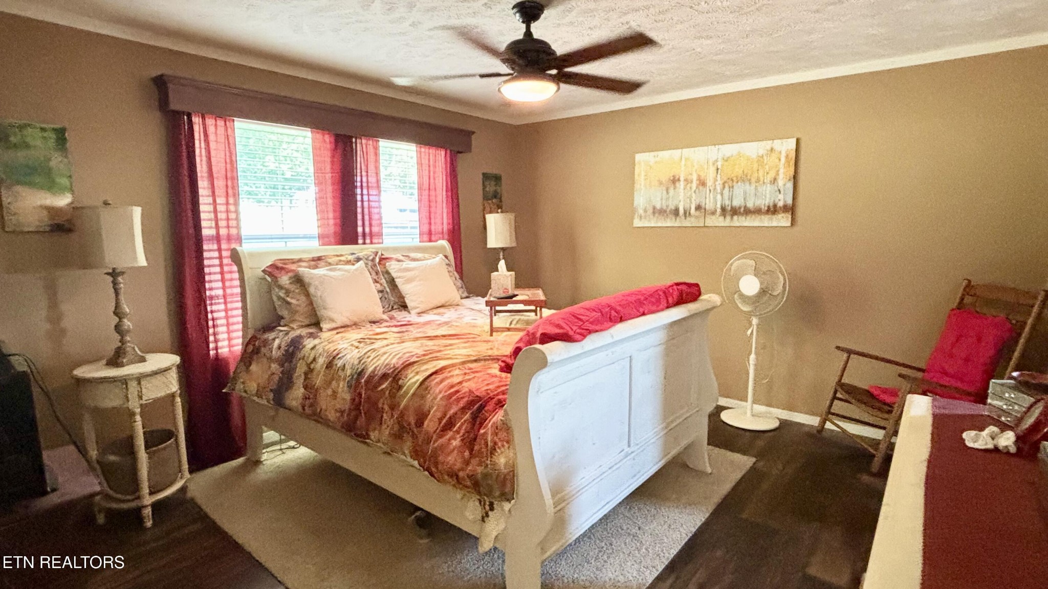 9400 Pedigo Road Powell, TN 37849 - Photo 8 of 18 a bedroom with a bed and a chandelier