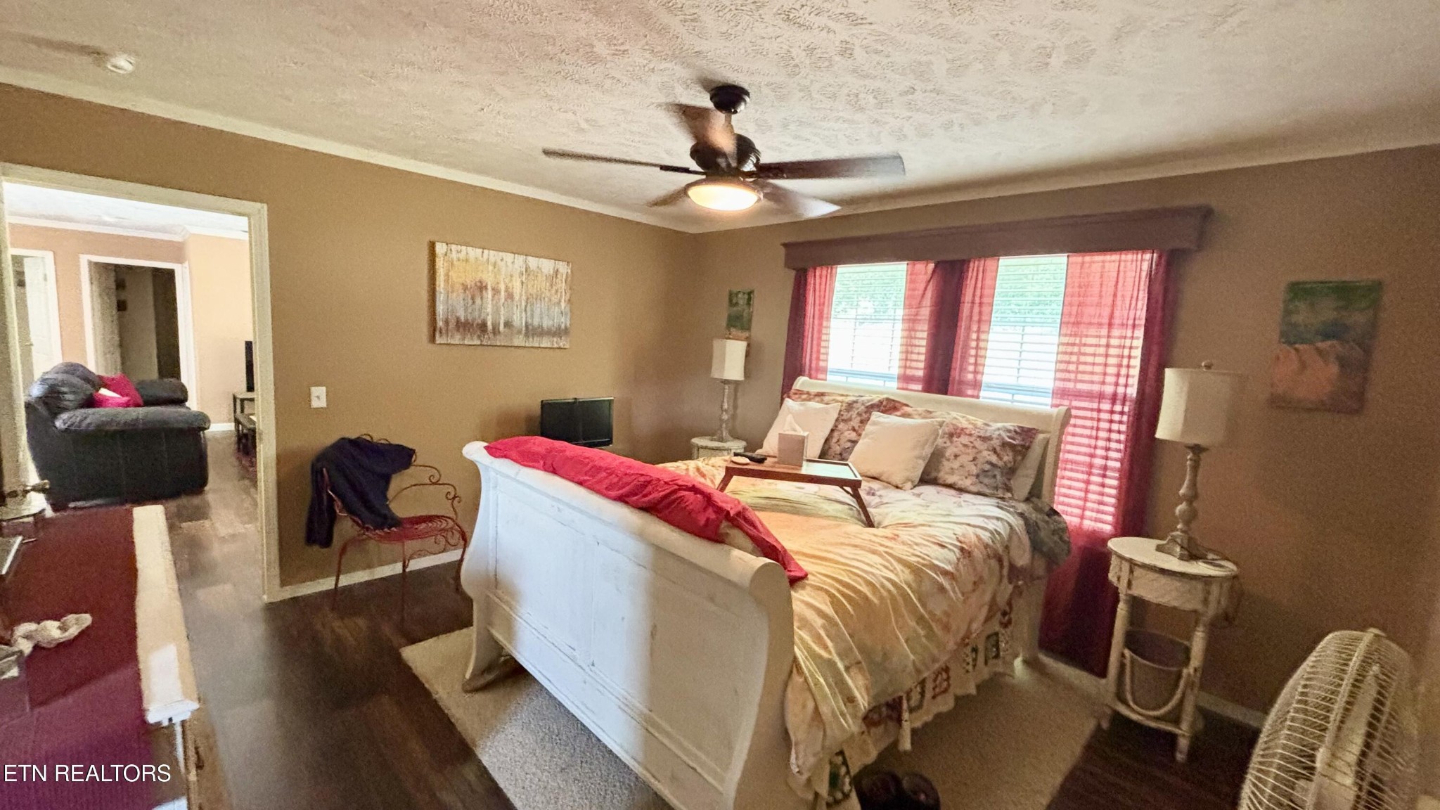 9400 Pedigo Road Powell, TN 37849 - Photo 9 of 18 a bed room with a bed and a chandelier