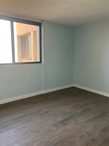 a bathroom with a bathtub and a toilet