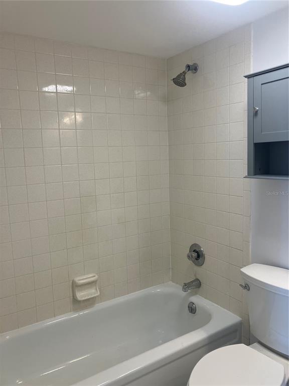 3006 Caring Way, Unit 612 Port Charlotte, FL 33952 - Photo 15 of 20 a bathroom with a bathtub and a toilet