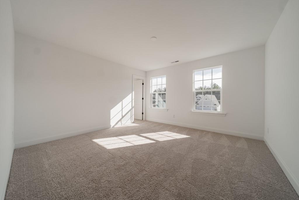 3210 Timber Run Lane Maiden, NC 28650 - Photo 27 of 30 an empty room with windows