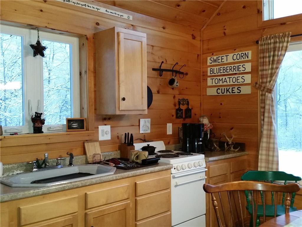 18 Bray Hill Road Phillips, ME 04966 - Photo 3 of 22 Kitchen has a dining area with...