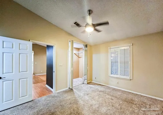 a view of livingroom with hardwood floor and ceiling fan