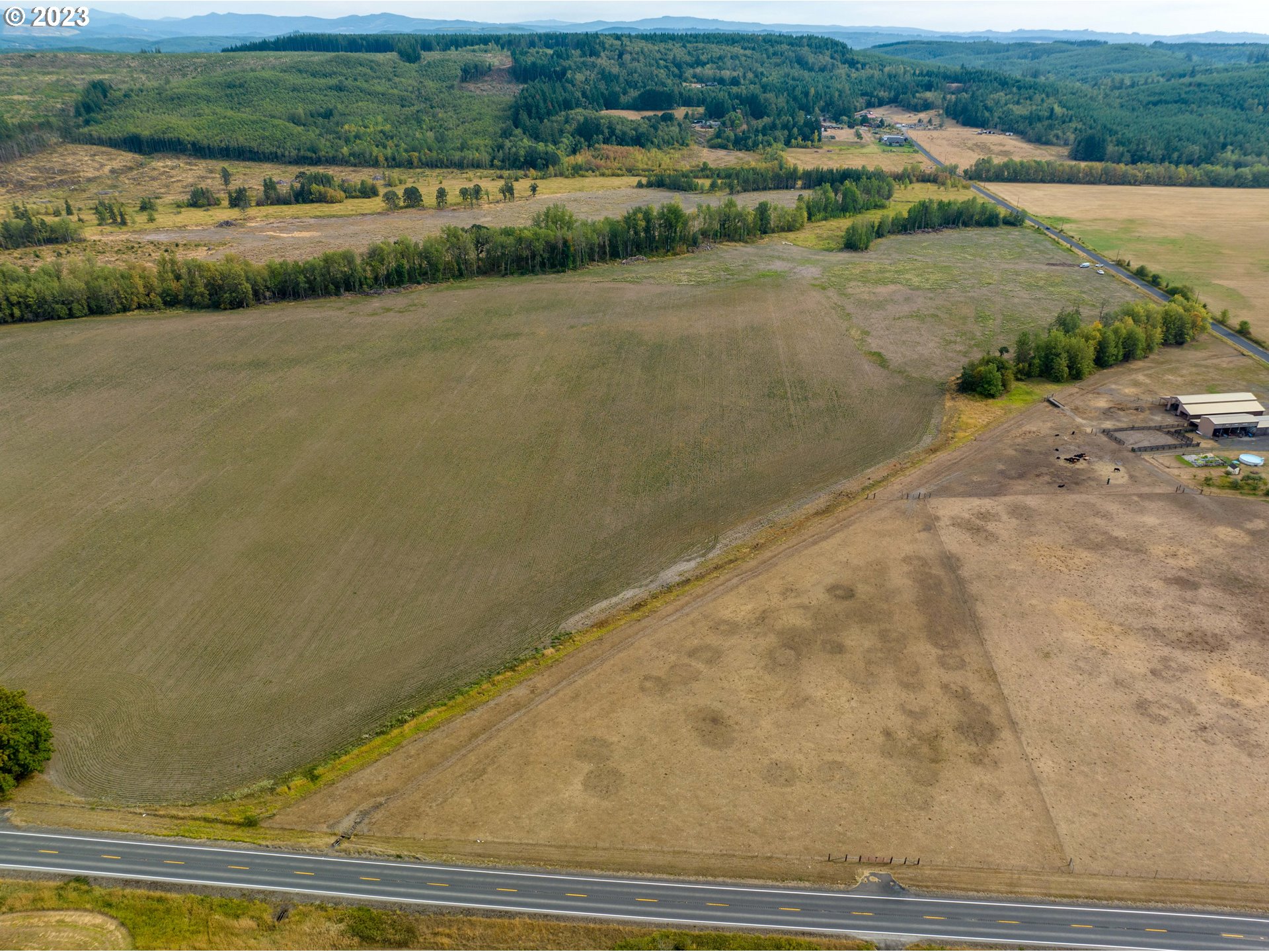 0 Maw Road, Unit 2 Toledo, WA 98591 - Photo 1 of 26 an aerial view of lake and residential houses with outdoor space