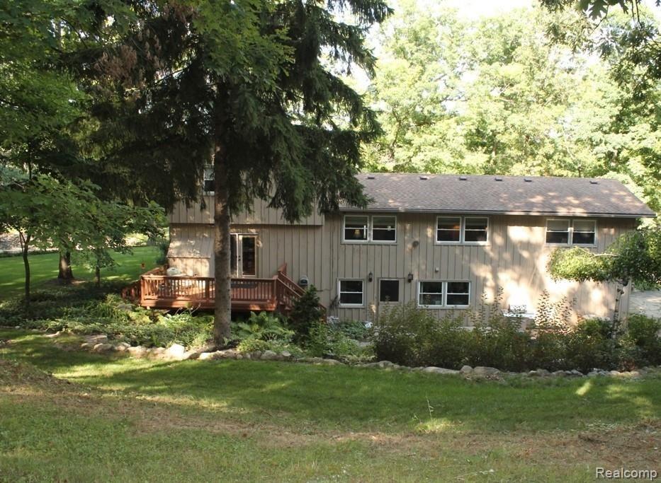 5355 Bullard Road Fenton, MI 48430 - Photo 3 of 66 Rear view of home and landscaping.JPG