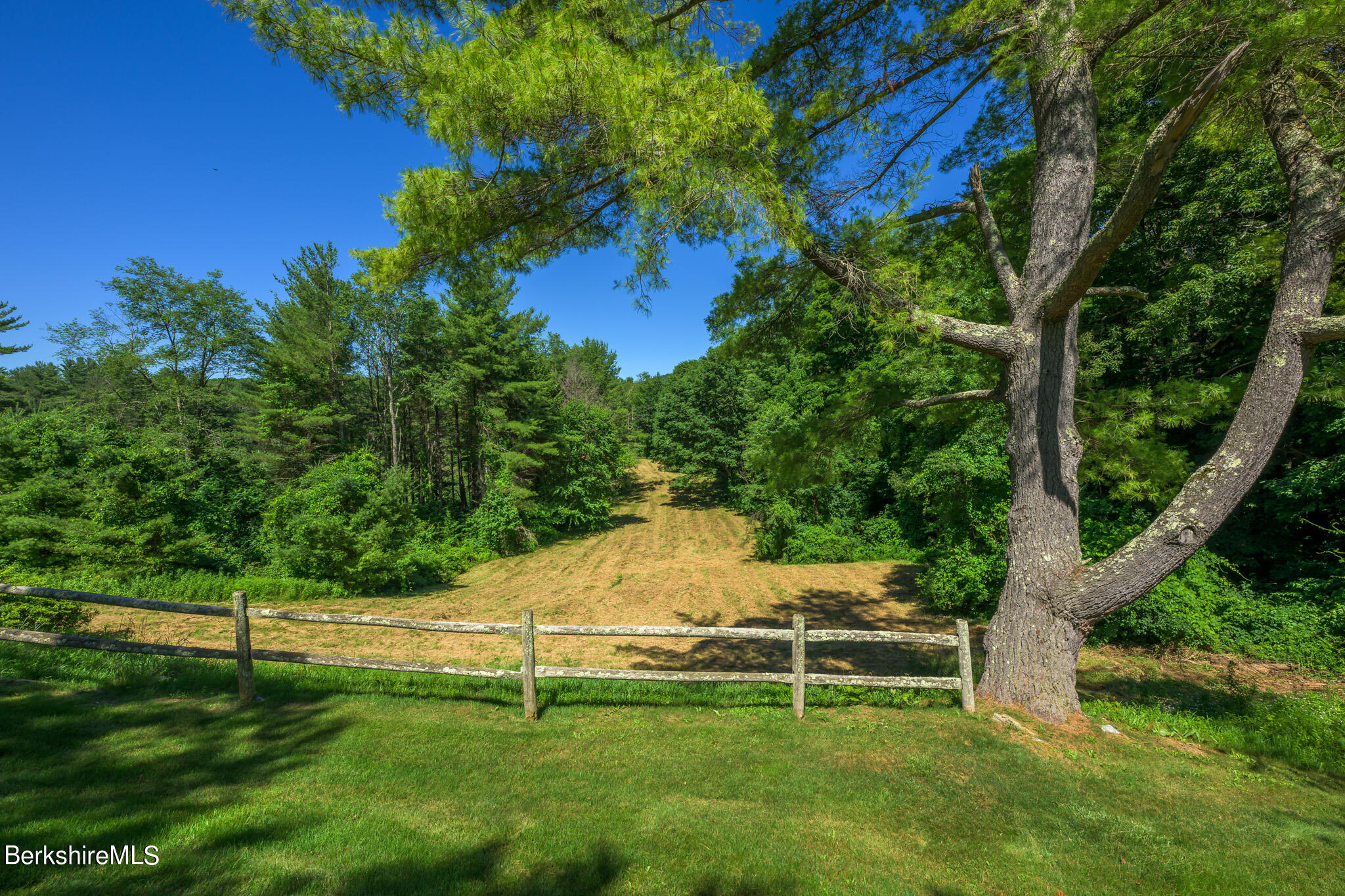 176 West Center Road West Stockbridge, MA 01266 - Photo 40 of 57 a backyard of a house with table and chairs