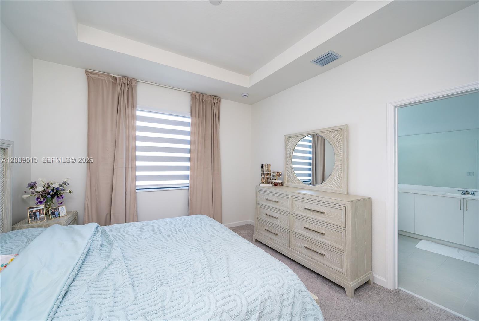 13311 Southwest 233rd Terrace Homestead, FL 33032 - Photo 13 of 21 a bedroom with a bed and a dresser