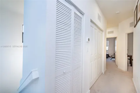 a view of a bathroom with a bathroom