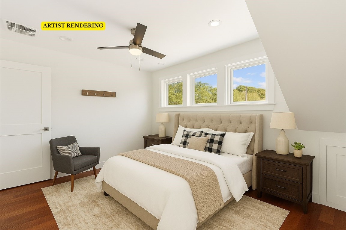 921 South 9th Street Fernandina Beach, FL 32034 - Photo 6 of 7 a bedroom with a bed and wooden floor