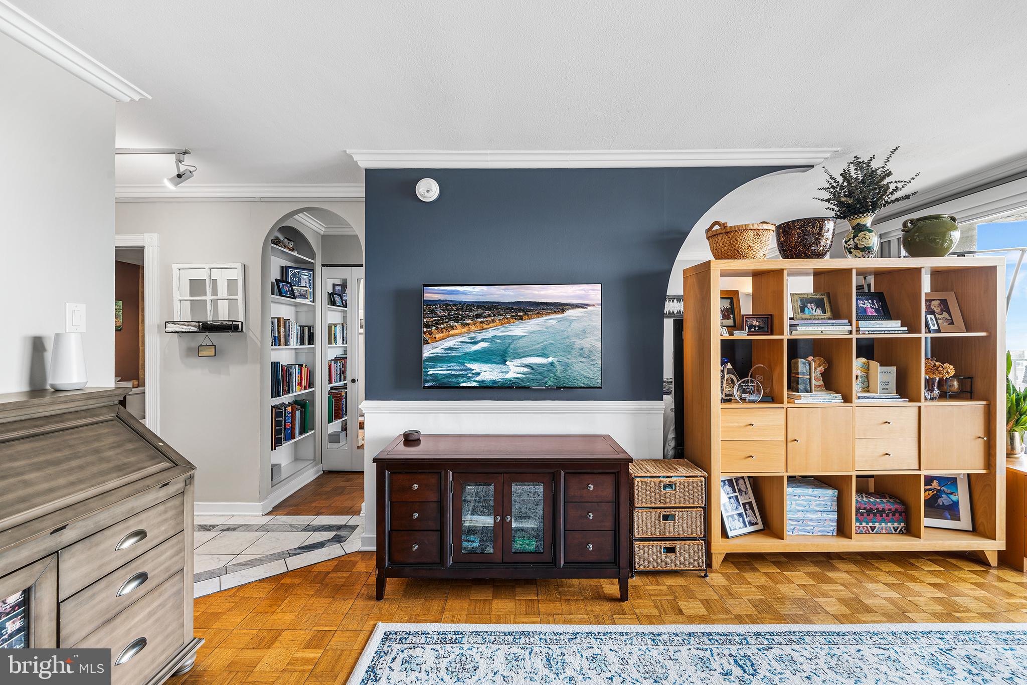 226-30 West Rittenhouse Square, Unit 2308 Philadelphia, PA 19103 - Photo 18 of 30 a living room with fireplace furniture and a flat screen tv