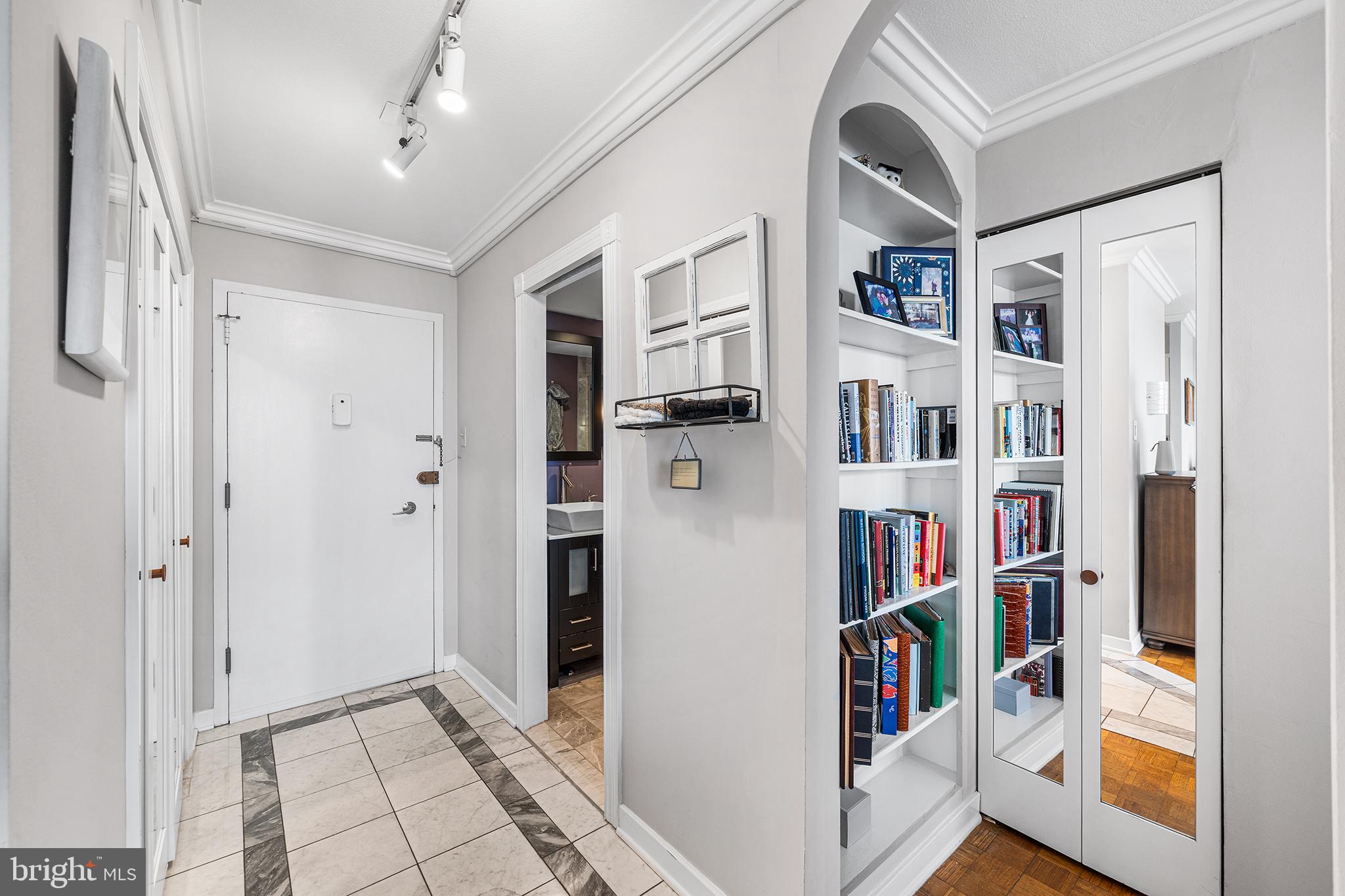 226-30 West Rittenhouse Square, Unit 2308 Philadelphia, PA 19103 - Photo 29 of 30 a view of walk in closet with clothes and shoes