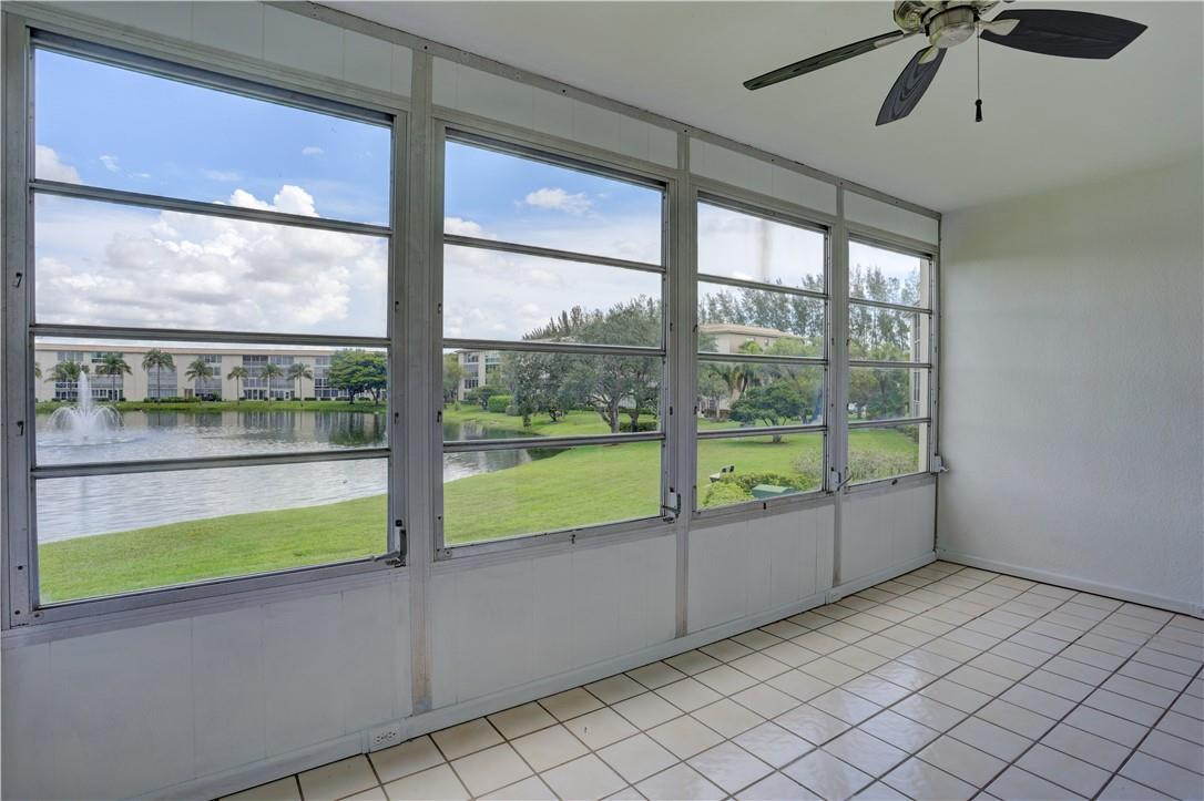 1903 Bermuda Circle, Unit E2 Coconut Creek, FL 33066 - Photo 2 of 25 a view of an empty room with window