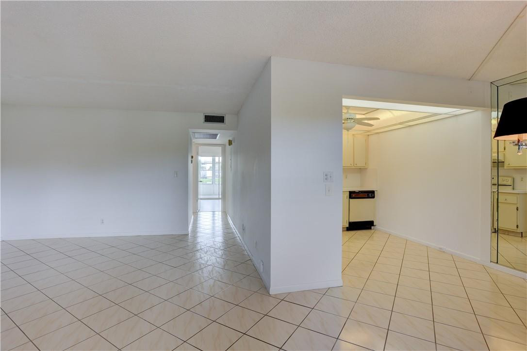 1903 Bermuda Circle, Unit E2 Coconut Creek, FL 33066 - Photo 7 of 25 a view of an empty room and closet area