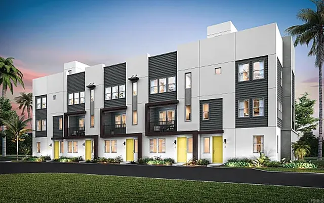 a front view of building with yard