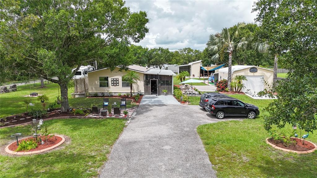a view of a house with a sink and yard
