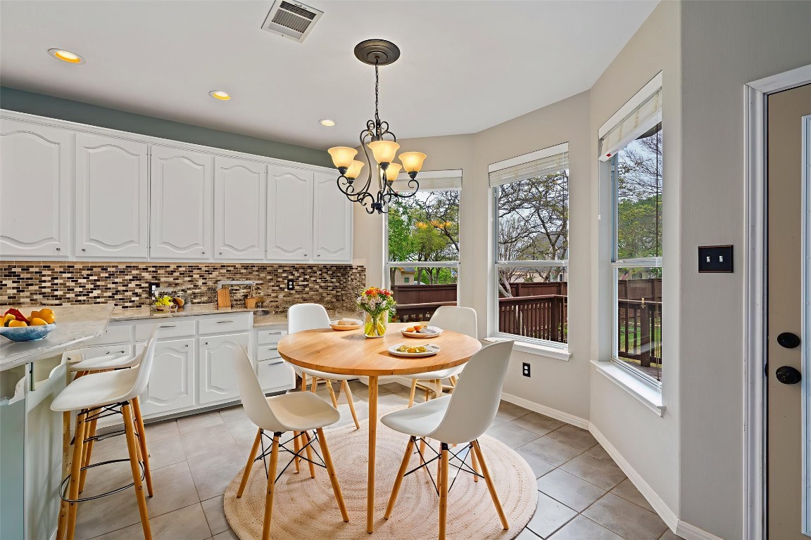 318 Ridge Run Drive Georgetown, TX 78628 - Photo 5 of 39 It is open to the breakfast area - also opening up the view to the oversized back yard.