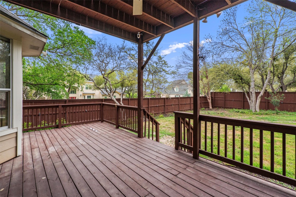 318 Ridge Run Drive Georgetown, TX 78628 - Photo 8 of 39 Easy access from the kitchen and living to the oversized deck - partly covered to gvie shade, but also be able to enjoy the sun.