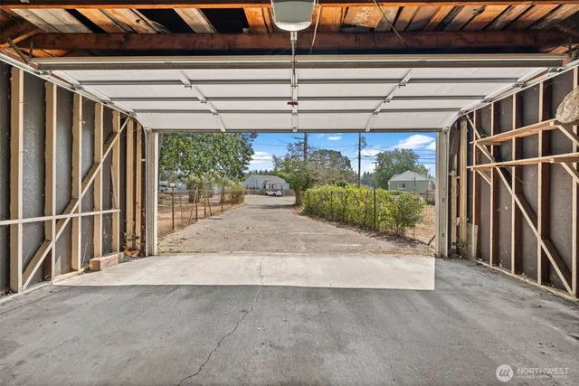 a view of a garage with wooden wall