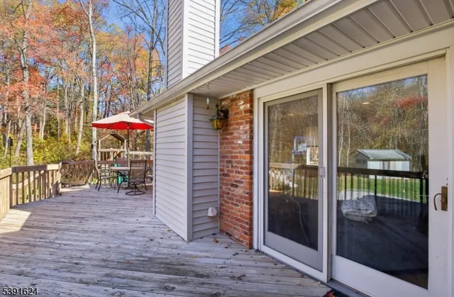 a view of a porch with a door and porch