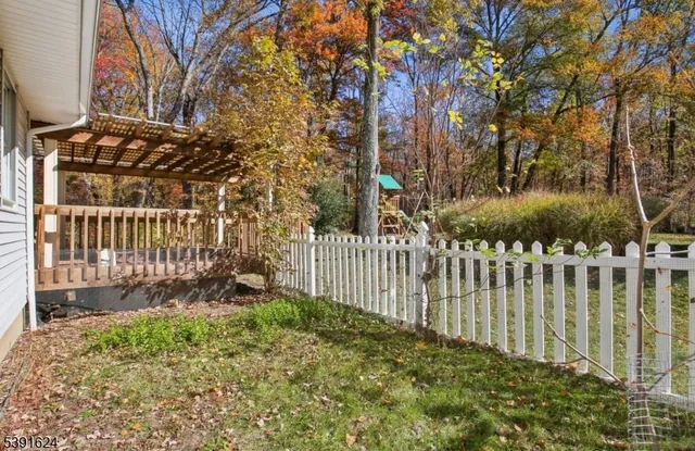 a view of a wooden fence