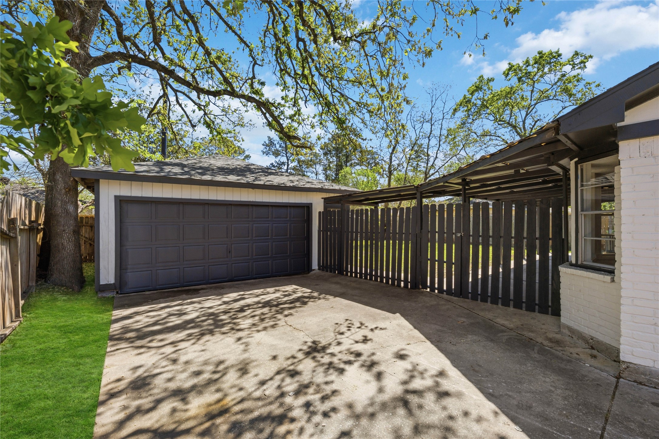 23222 Earlmist Drive Spring, TX 77373 - Photo 27 of 28 Detached garage with covered walkway to inside