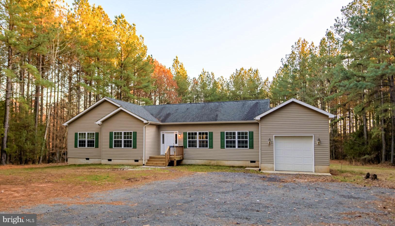 11409 Robins Ridge Road Unionville, VA 22567 - Photo 1 of 12 Spacious one-level living on over 15 acres