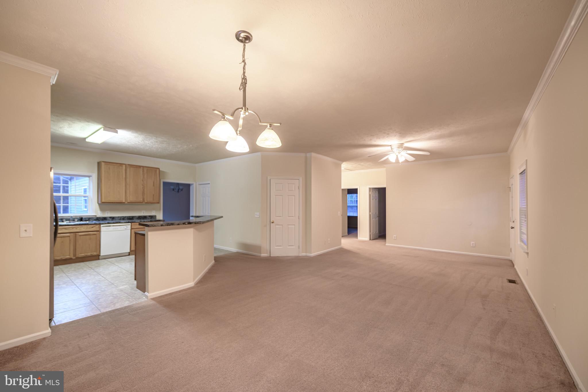 11409 Robins Ridge Road Unionville, VA 22567 - Photo 4 of 12 Huge family room with kitchen table space