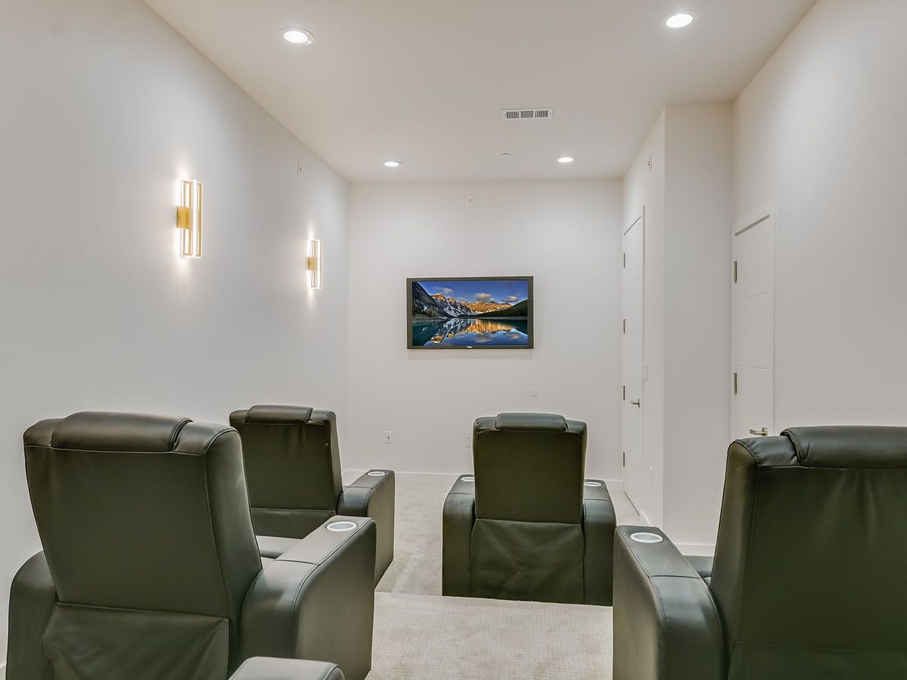 2476 Waymaker Way Austin, TX 78746 - Photo 21 of 31 Indulge in cinematic experiences within this dedicated media room.
