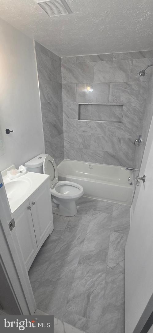 6311 Teaberry Way Clinton, MD 20735 - Photo 8 of 13 Modern bathroom with sleek finishes.
