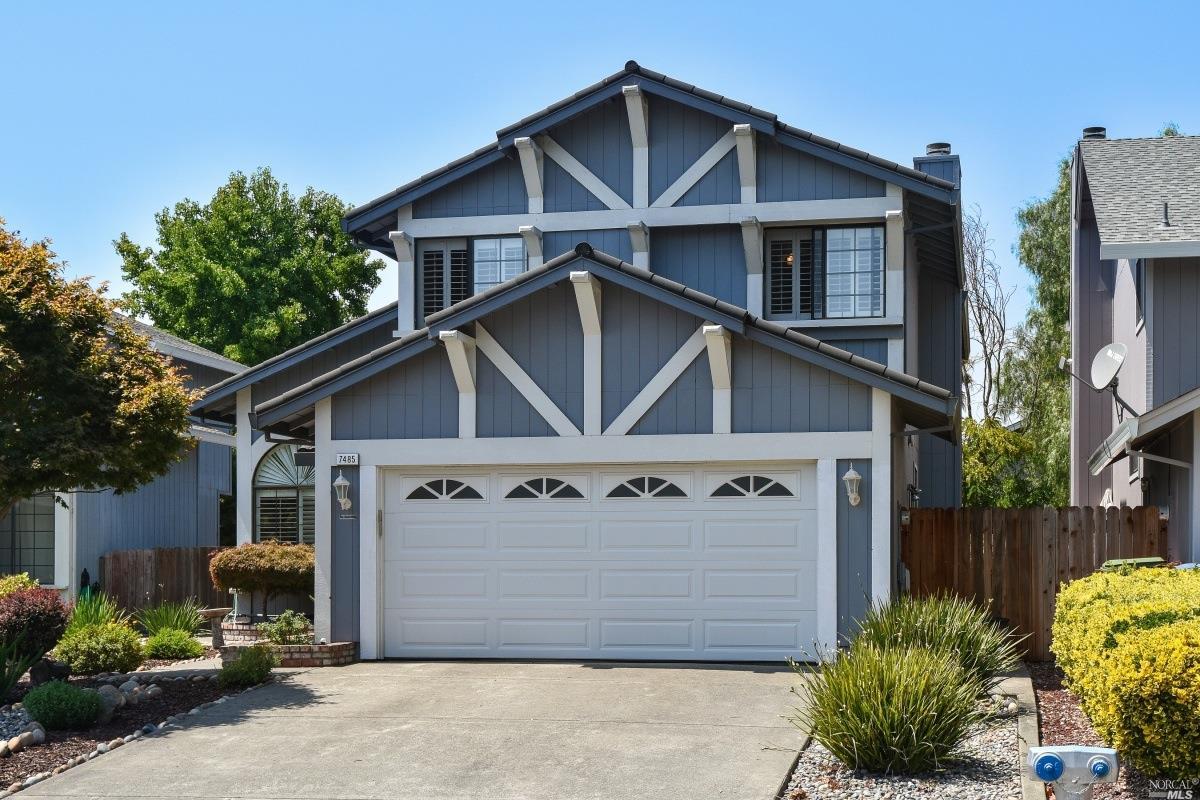 7485 Mitchell Drive Rohnert Park, CA 94928 - Photo 1 of 1 a view of a house with a yard and large windows