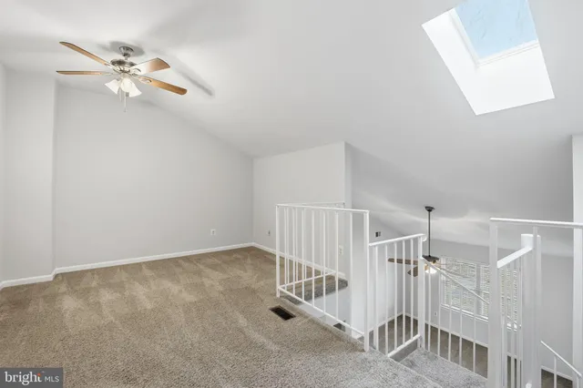 a view of a livingroom with a staircase