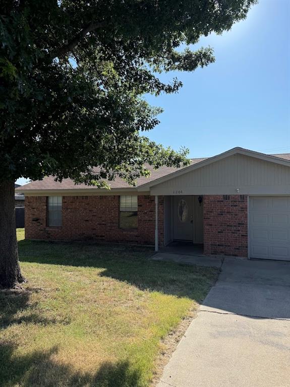 11204 Liberty School Road Pelican Bay, TX 76020 - Photo 2 of 23 a view of a backyard