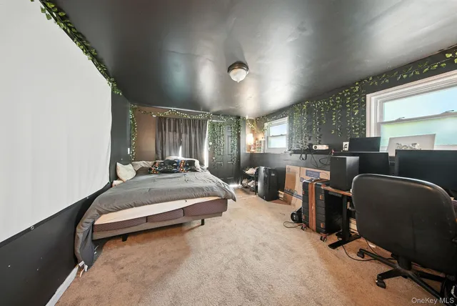 a bed room with furniture and a window