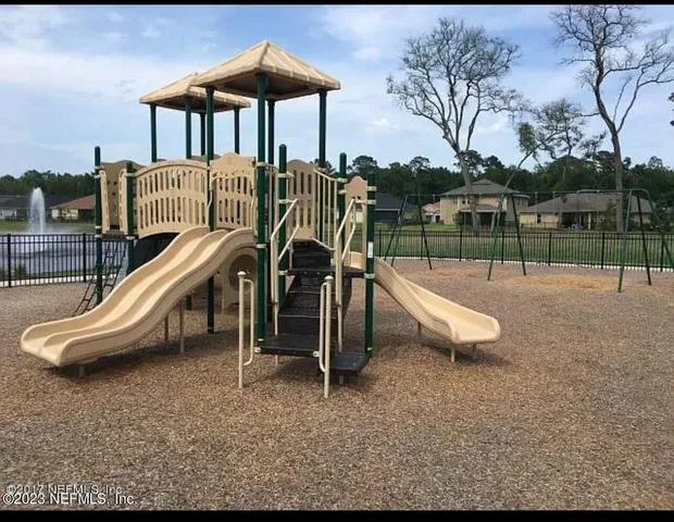 a view of a park with slide