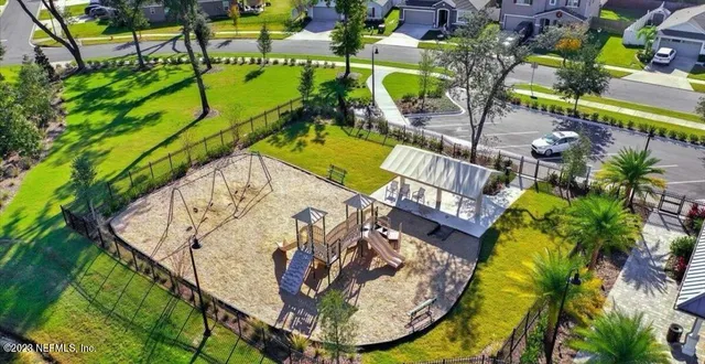 a view of swimming pool with a patio