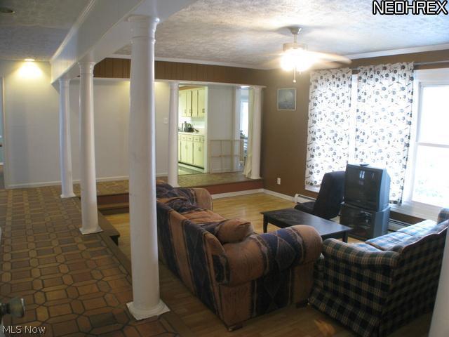 11230 Elk Run Road Chardon, OH 44024 - Photo 6 of 8 Living room looking towards kitchen, dining room and family room
