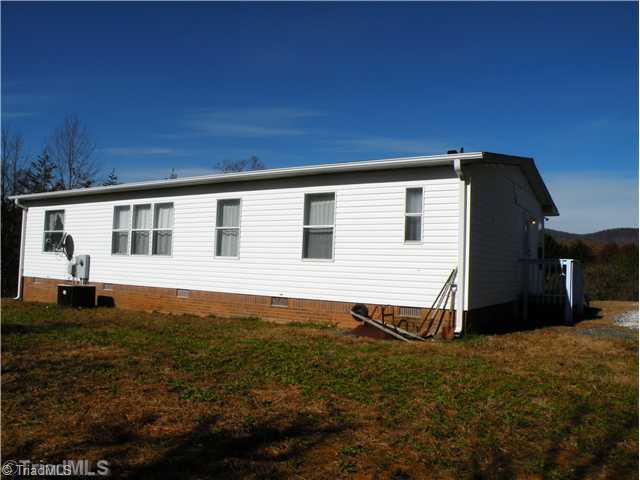 1488 Harris Road Walnut Cove, NC 27052 - Photo 13 of 16 Exterior Back.