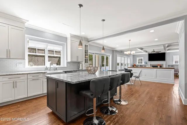 a bedroom with bed and window