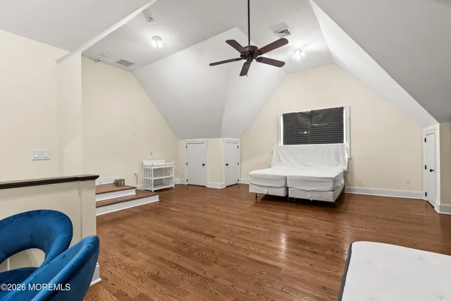 a bathroom with a sink vanity and a mirror