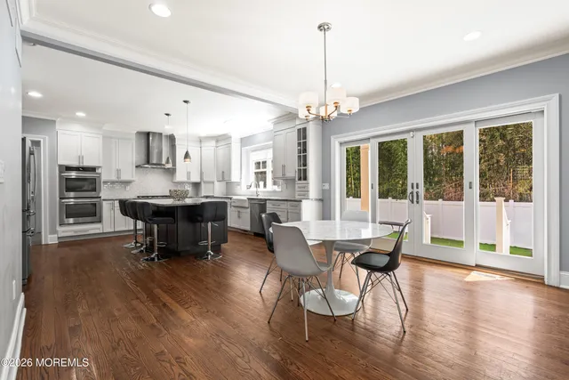 a bathroom with a shower a toilet and sink
