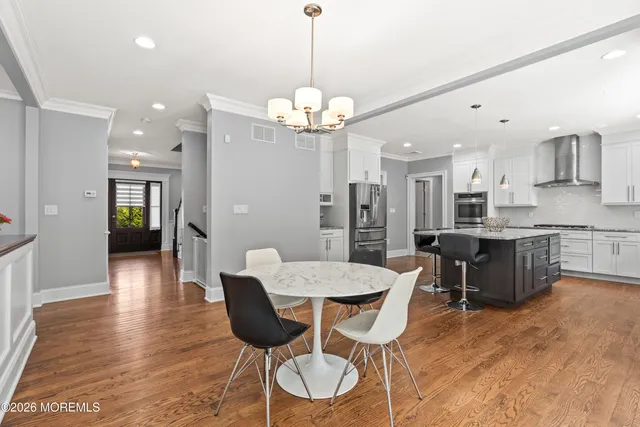 a spacious bedroom with a bed and a window