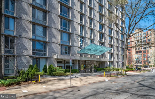 a view of a building with a street