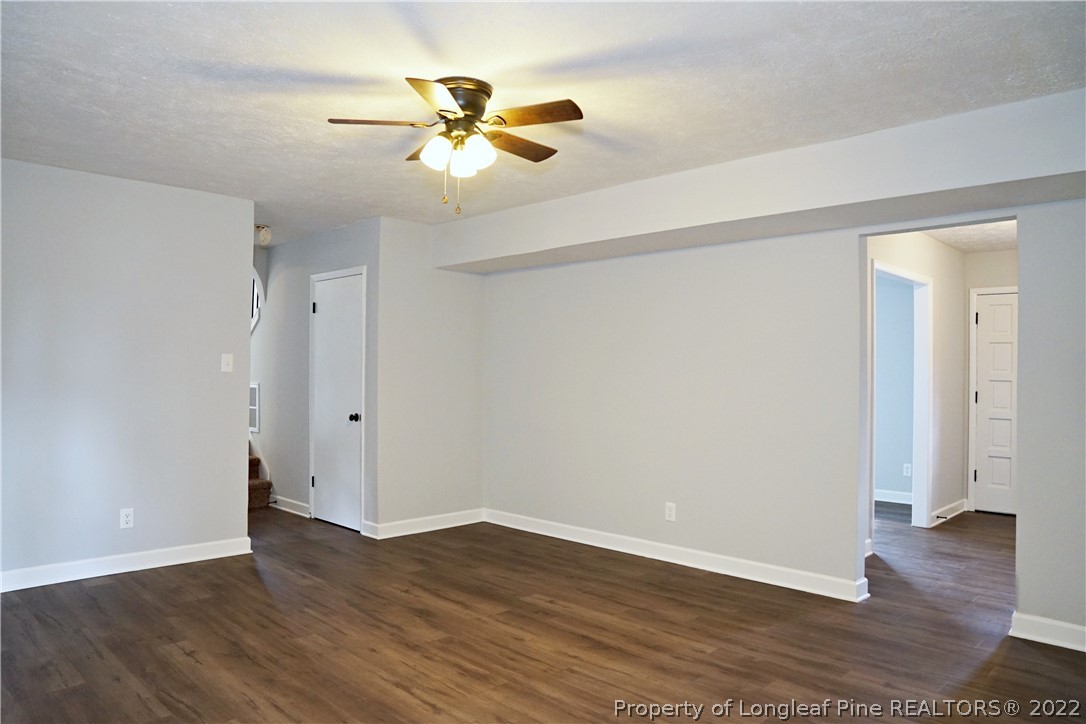 197 Paddle Wheel Road Fayetteville, NC 28314 - Photo 21 of 39 a view of an empty room with wooden floor