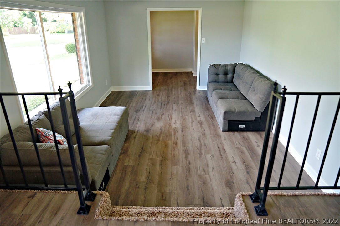 197 Paddle Wheel Road Fayetteville, NC 28314 - Photo 10 of 39 a view of a hardwood floor and an entryway