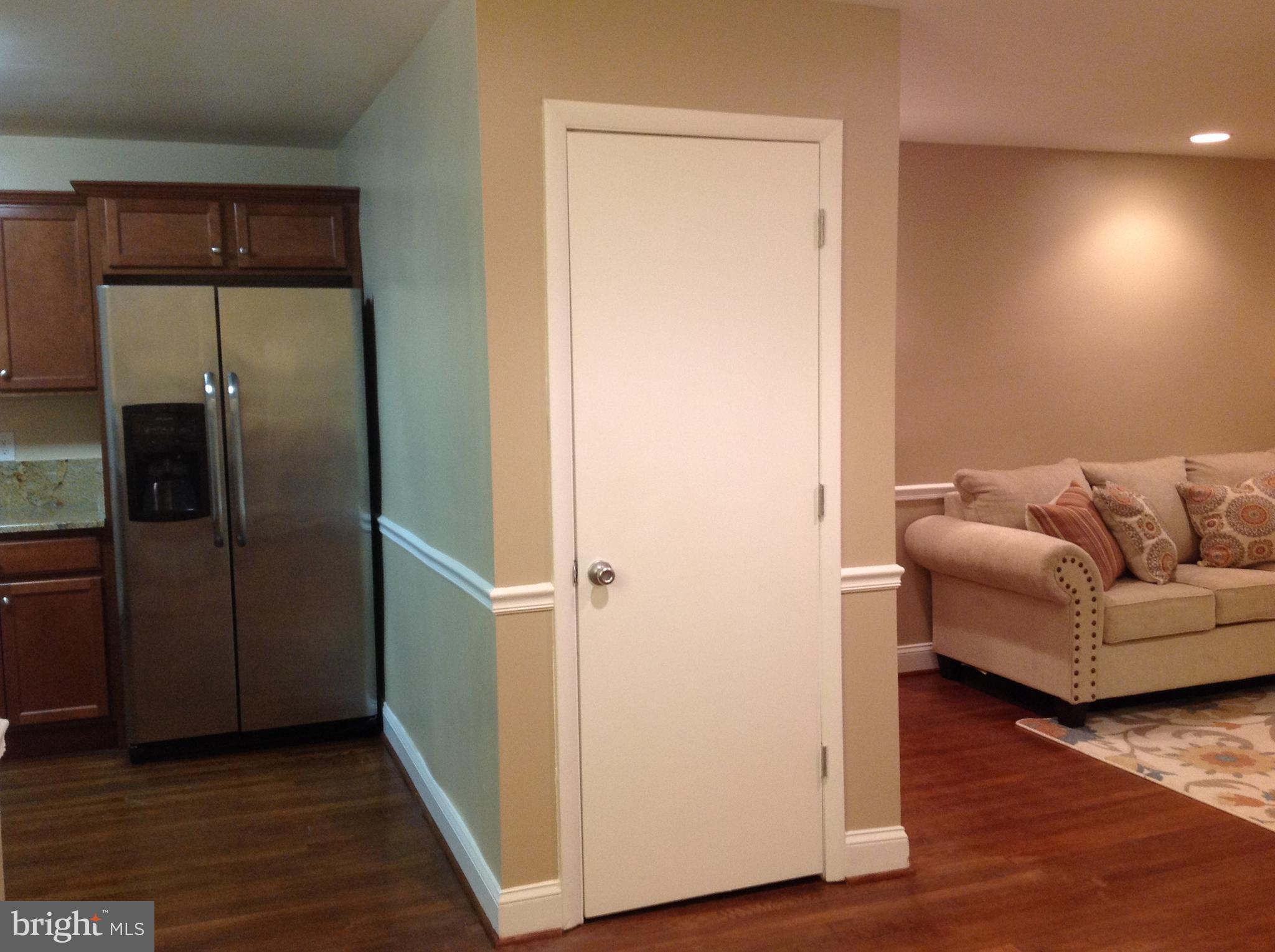4005 Annellen Road Baltimore, MD 21215 - Photo 12 of 30 partial view of kitchen, living room & pantry