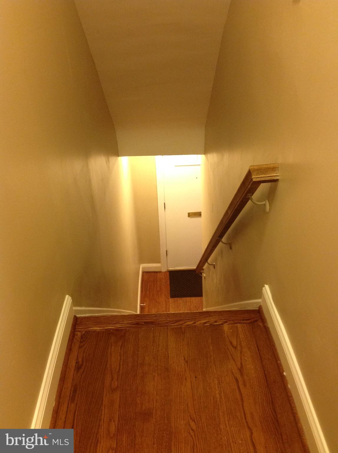 4005 Annellen Road Baltimore, MD 21215 - Photo 20 of 30 Stairs looks down to front door