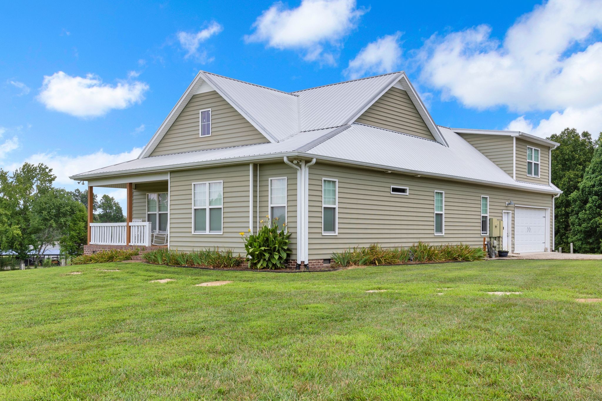 828 Wills Road Dickson, TN 37055 - Photo 3 of 53 a front view of a house with a yard