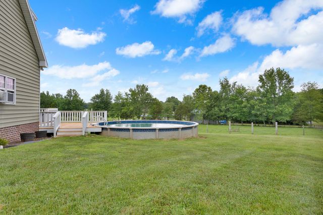 front view of a house with a big yard