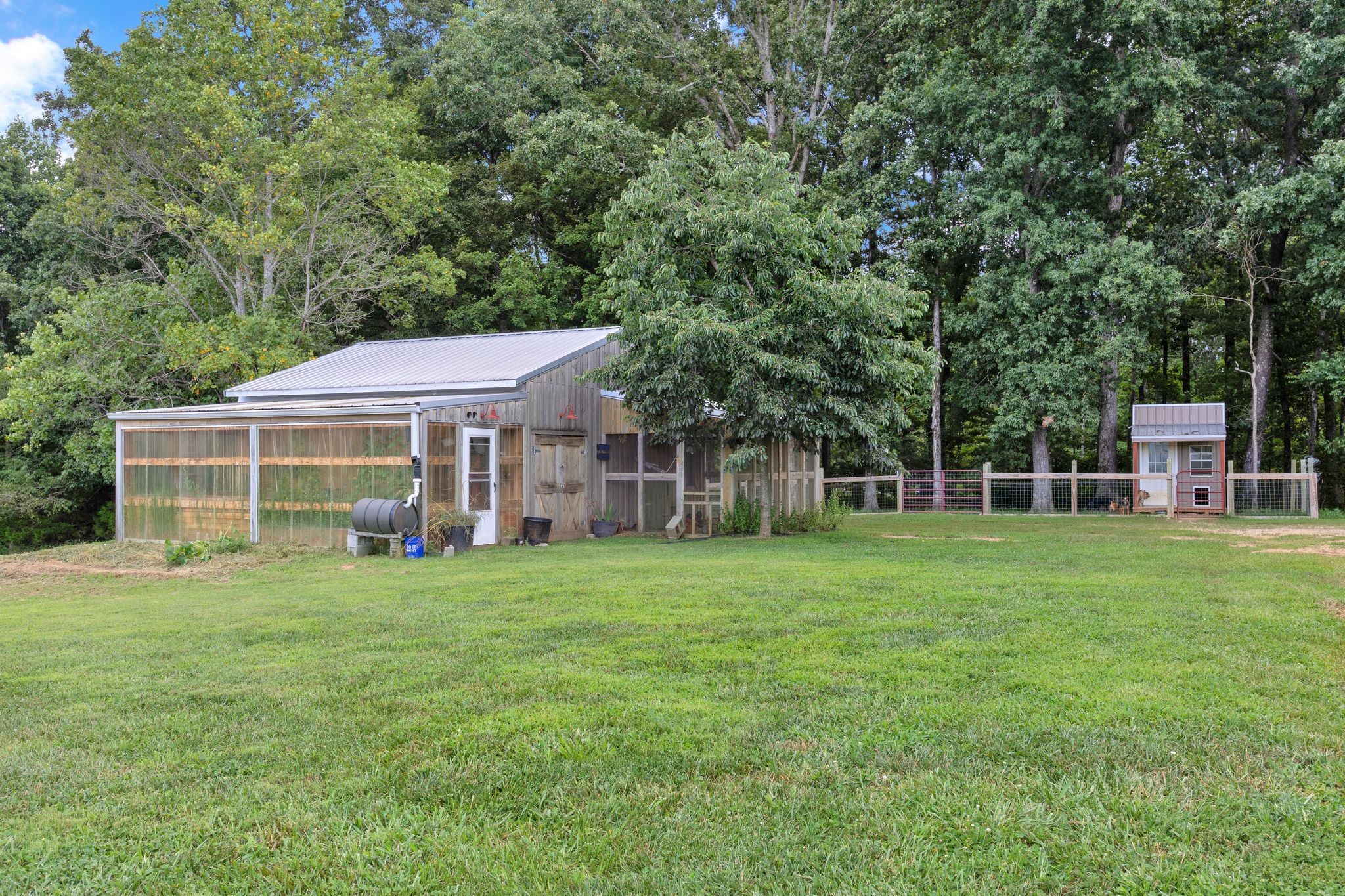 828 Wills Road Dickson, TN 37055 - Photo 44 of 53 a view of a sitting area in front of a house