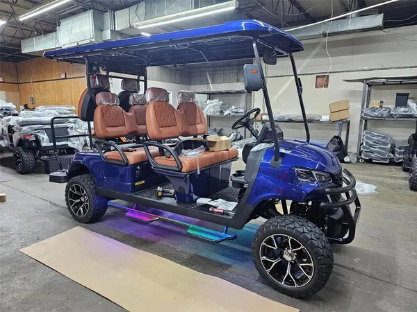 a view of swimming pool with outdoor seating